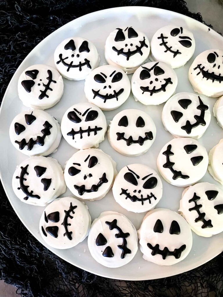 Jack Skellington Chocolate Covered Oreos on a large white plate