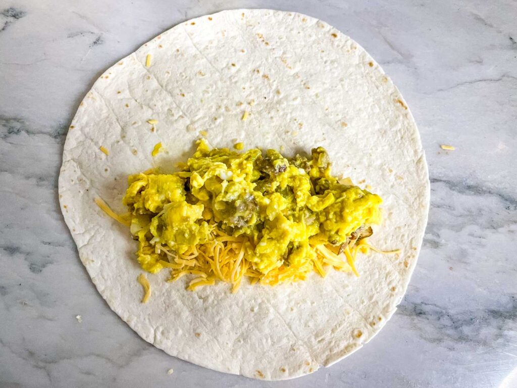 The filling sitting on a tortilla