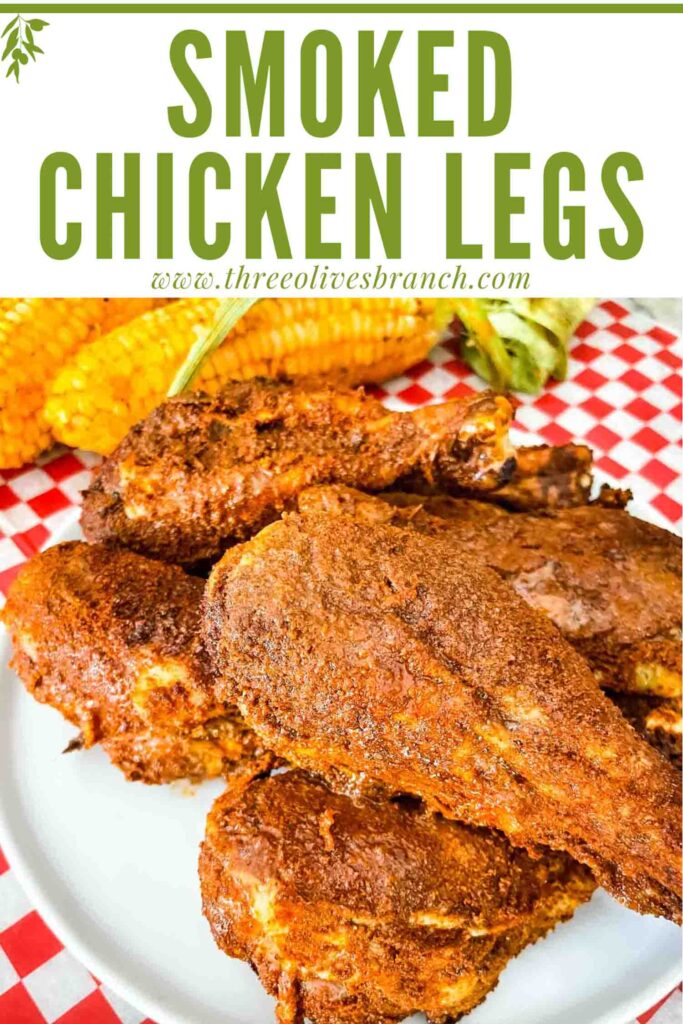 Pin of Smoked Chicken Legs in a pile on a red checkered placemat with title at top