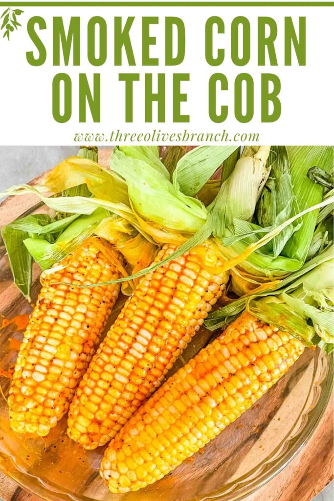 Pin of Smoked Corn on the Cob in a glass dish with title at top