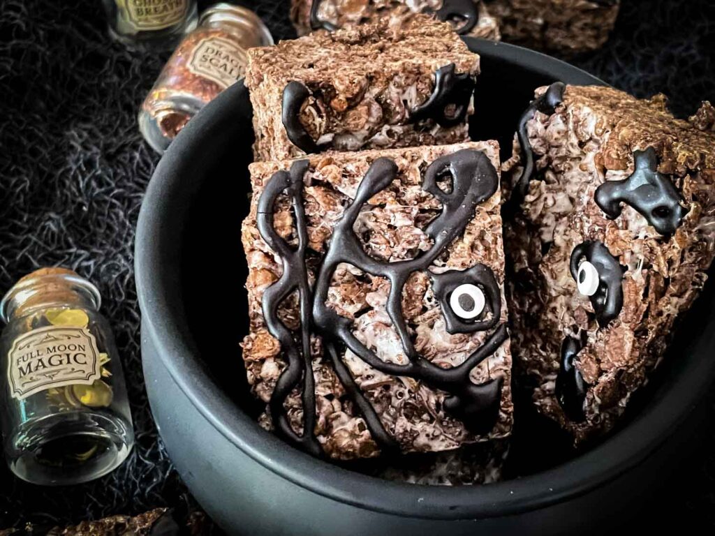 Hocus Pocus Spell Book Rice Krispie Treats in a cauldron