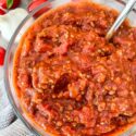 Closer view of Meat Sauce in a glass bowl on a counter