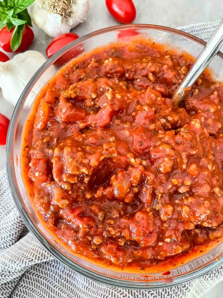 Closer view of Meat Sauce in a glass bowl on a counter