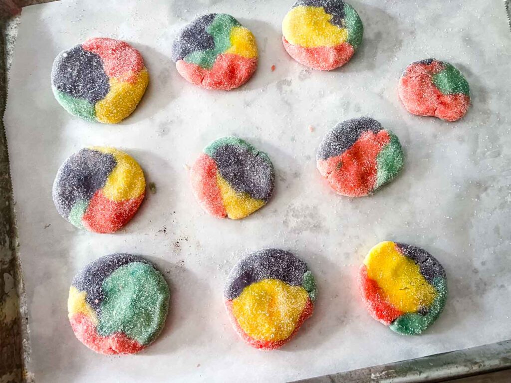 The raw cookies sitting on parchment before baking