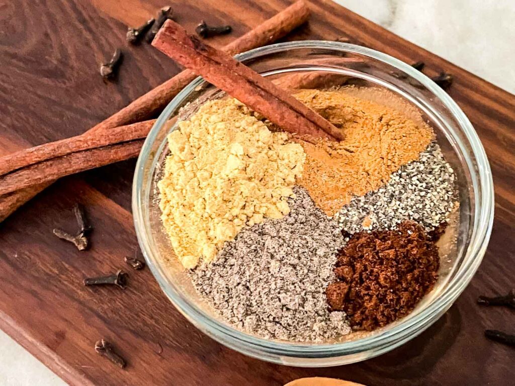 The Chai Spices separated in a small glass bowl