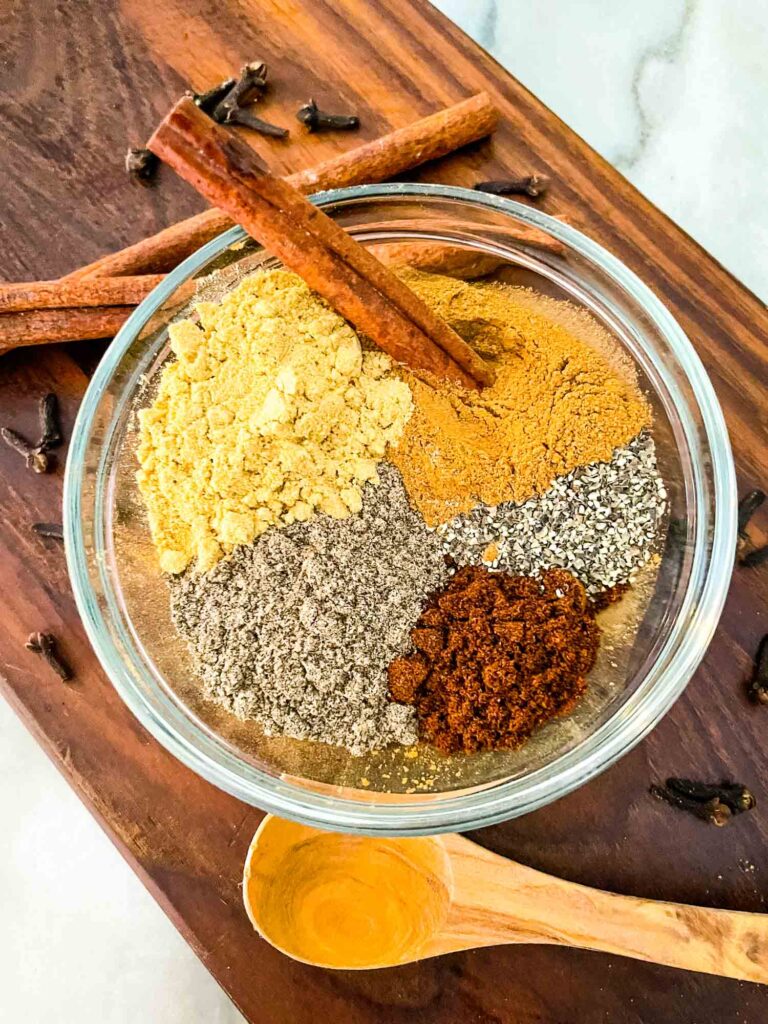 Top view of Chai Spices in a clear bowl still separated