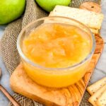 Pear Jam in a clear bowl sitting on wood