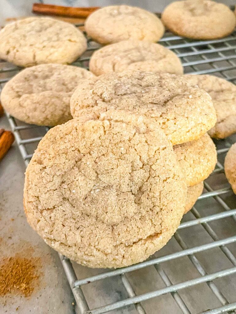 A pile of Chai Sugar Cookies with one on its side
