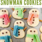 Pin of Shortbread Snowman Cookies on a counter with title at top