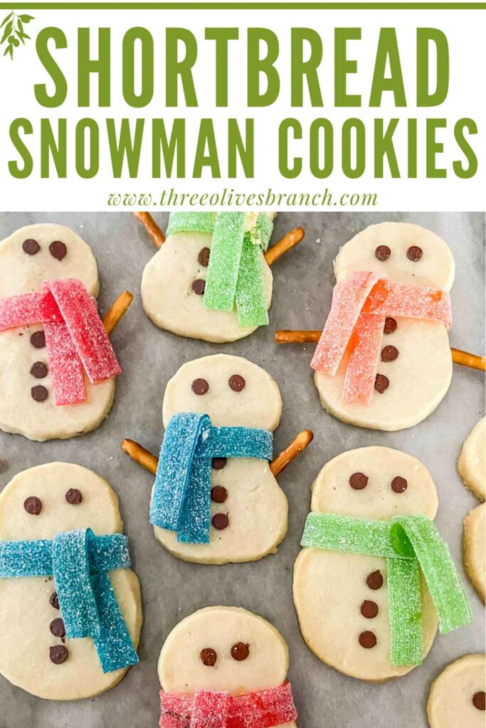 Pin of Shortbread Snowman Cookies on a counter with title at top