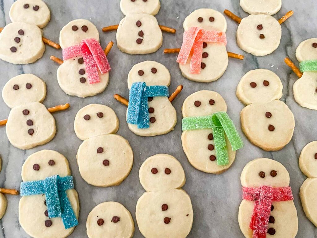 Shortbread Snowman Cookies on a counter