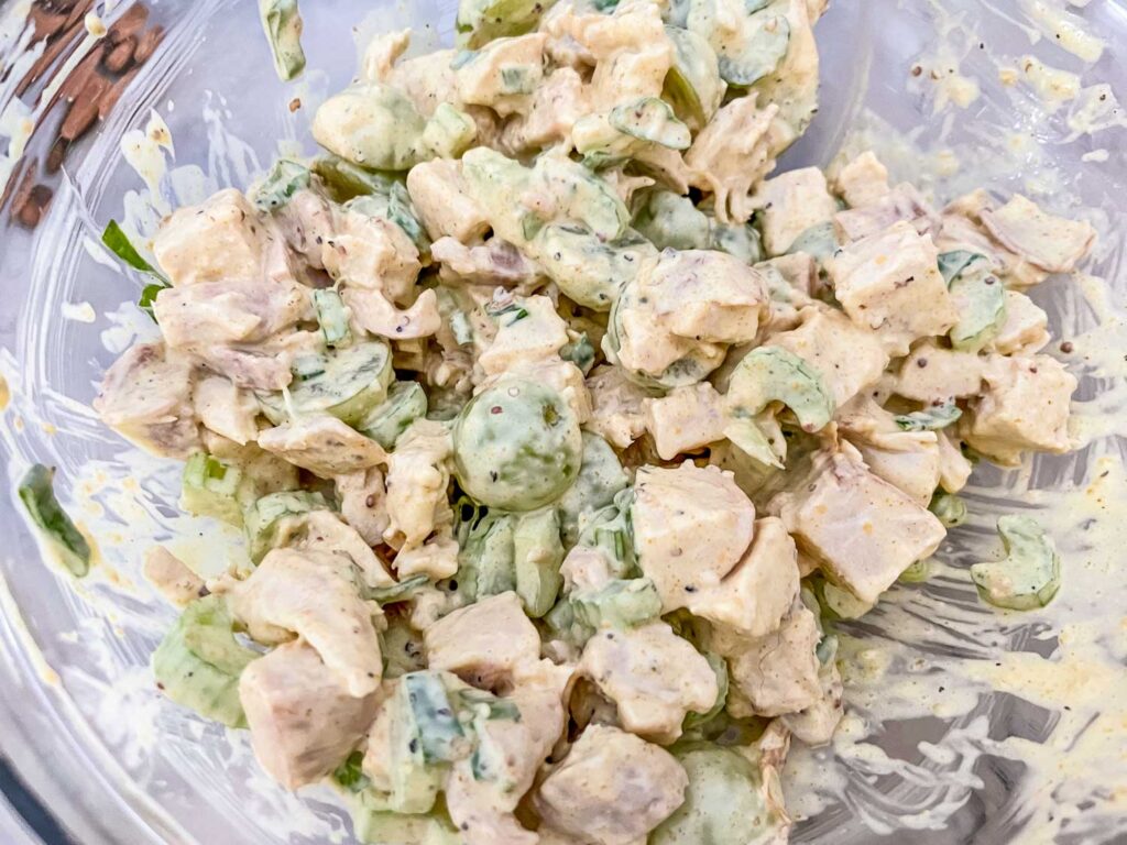 The Curry Chicken Salad after being mixed in a glass bowl