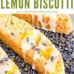 Pin of Lavender Lemon Biscotti up close on top of lavender buds with title at top