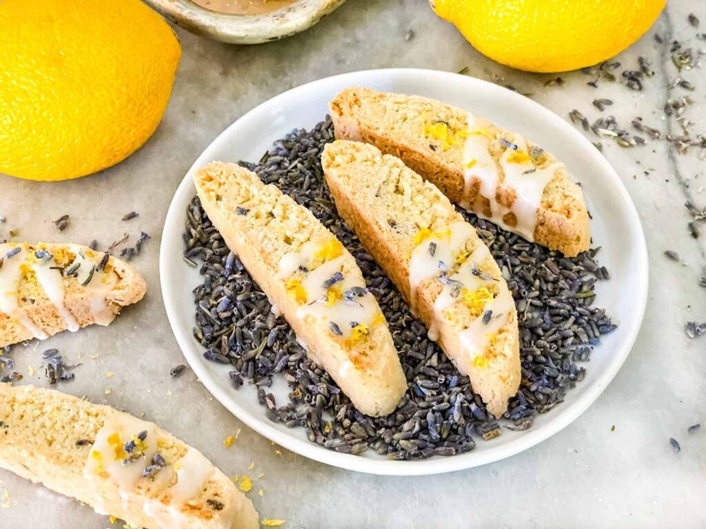 Lavender Lemon Biscotti on top of lavender on a small plate