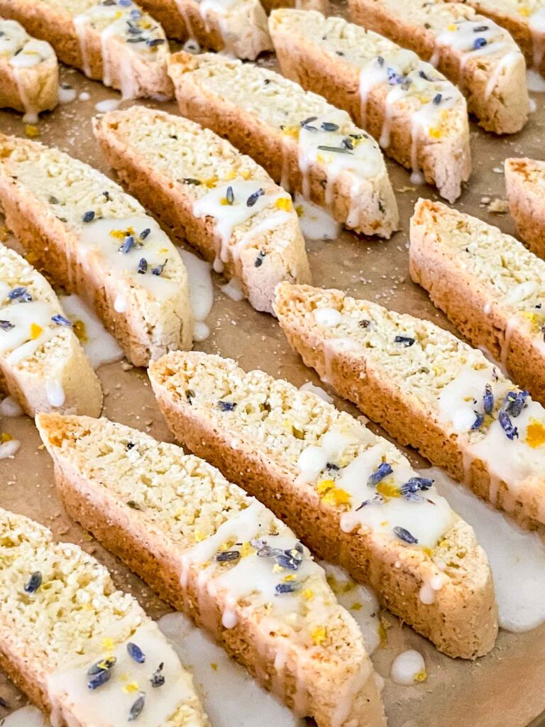Lavender Lemon Biscotti lined up on a baking sheet