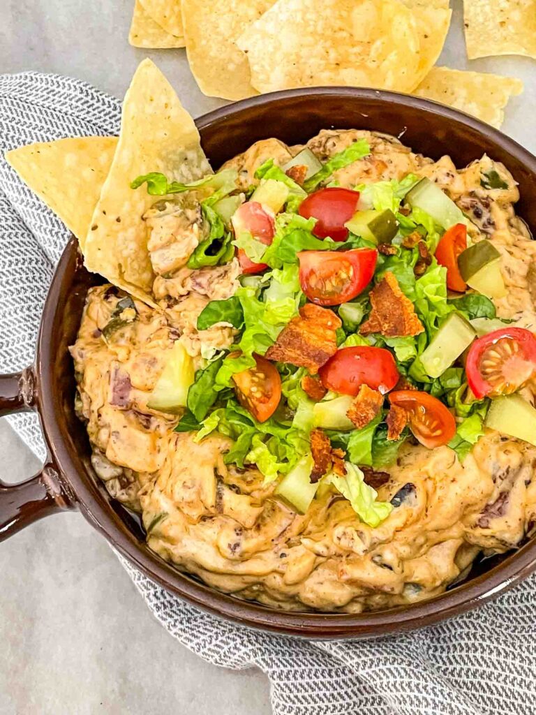 Bacon Cheeseburger Dip in a brown dish from the top view