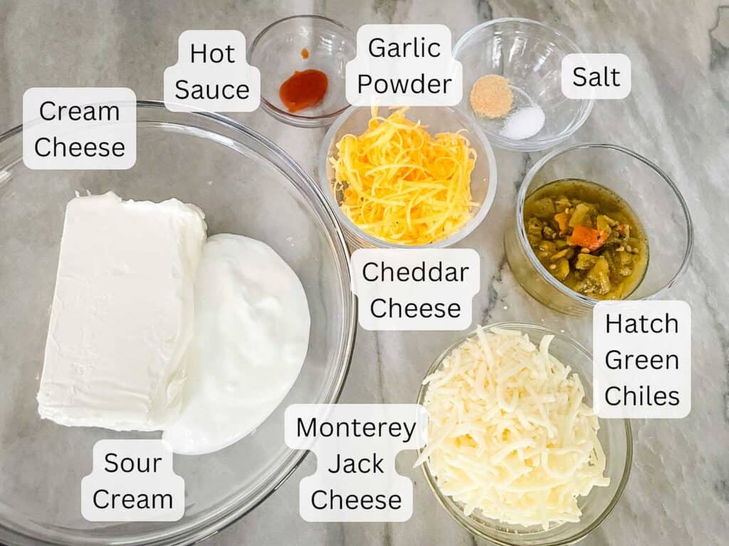 The ingredients in bowls on a counter and labeled