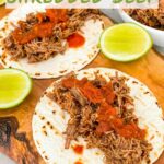 Pin of Instant Pot Shredded Beef Barbacoa on tortillas with title