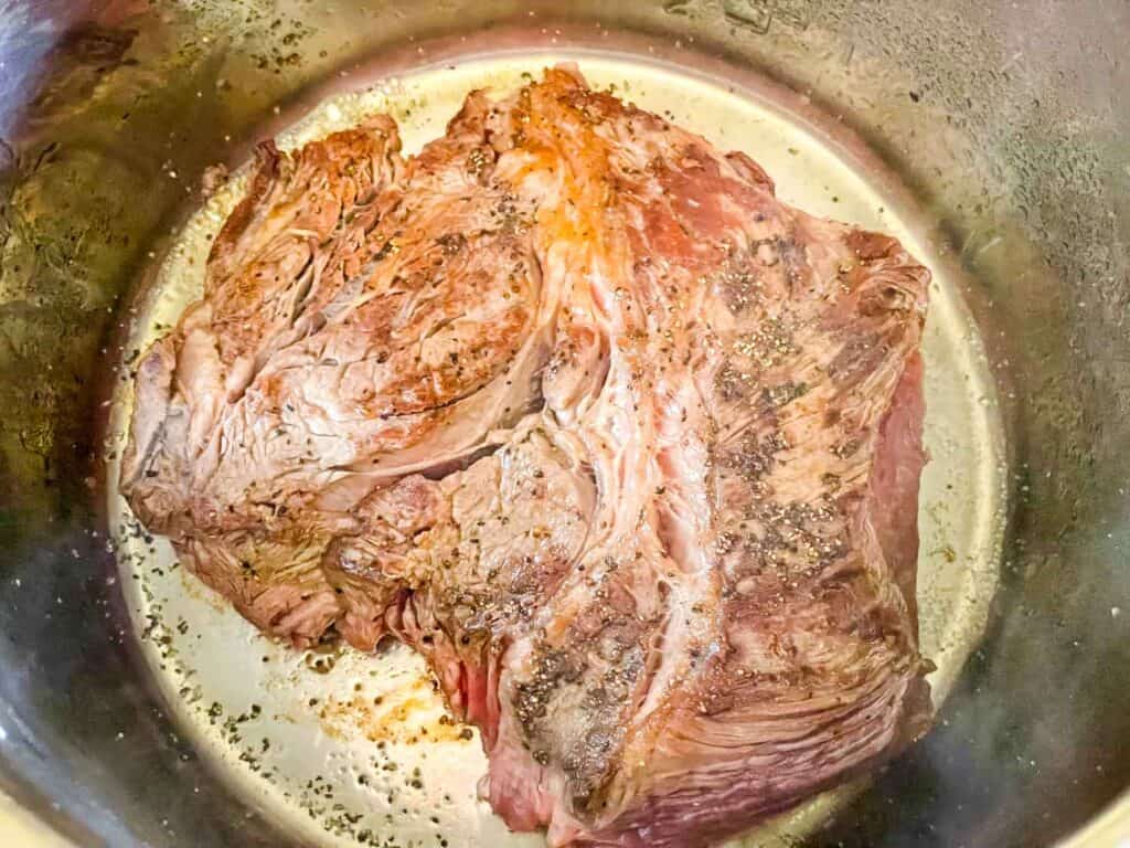 The beef being seared