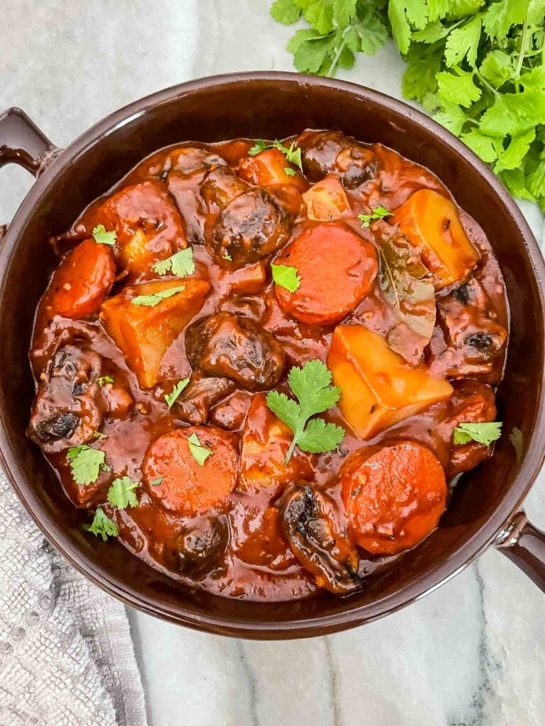 Top view of Vegan Stew in a brown bowl