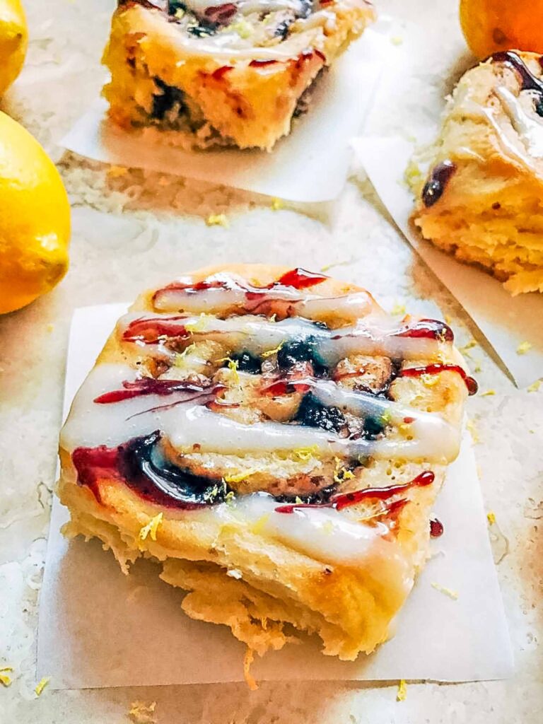 Close view of a single Blueberry Lemon Sweet Roll on a counter