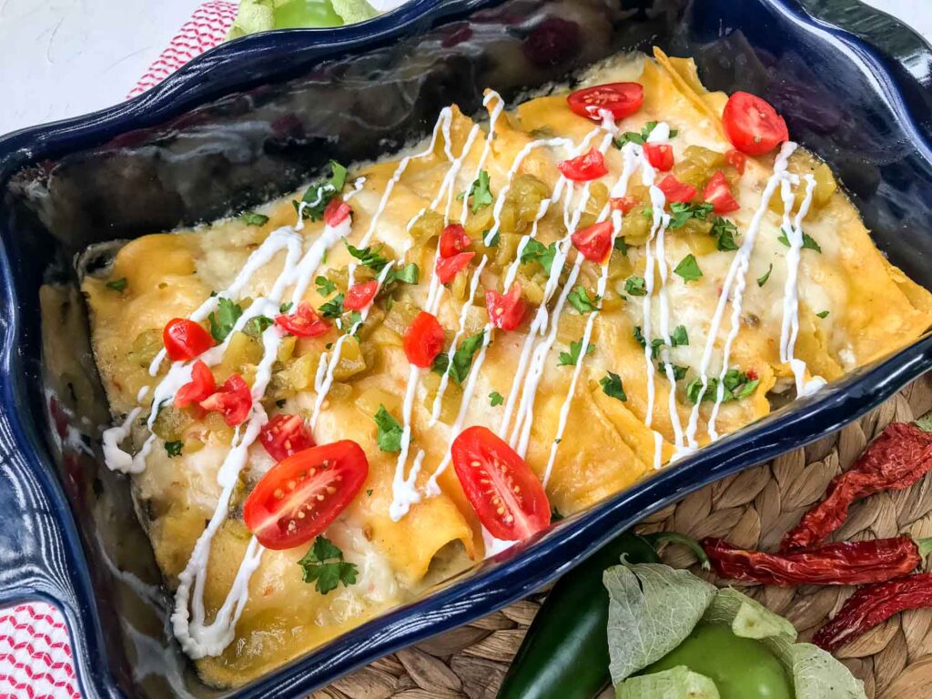 Creamy Chicken Enchiladas in a blue dish