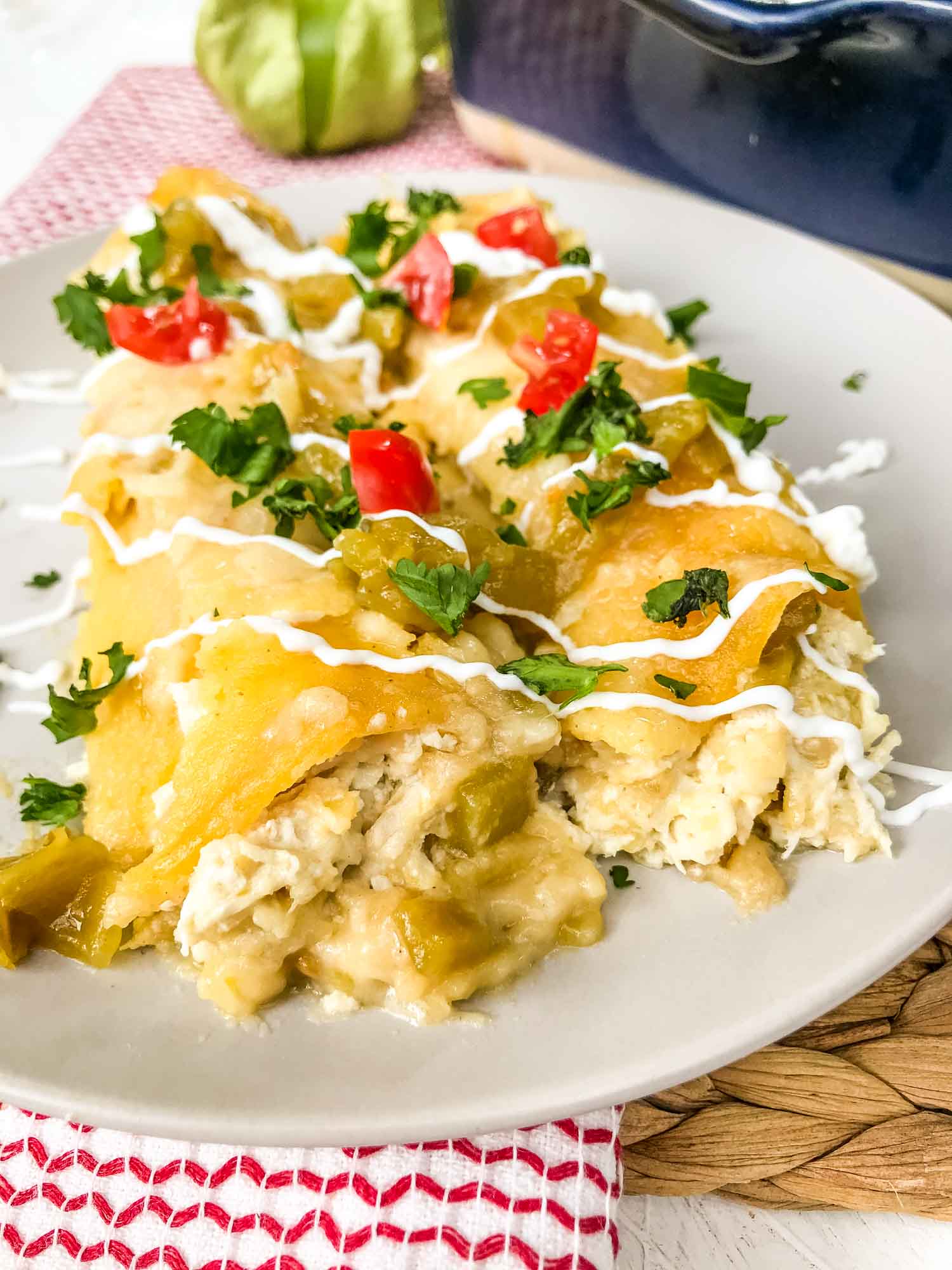End view of two Creamy Chicken Enchiladas on a plate