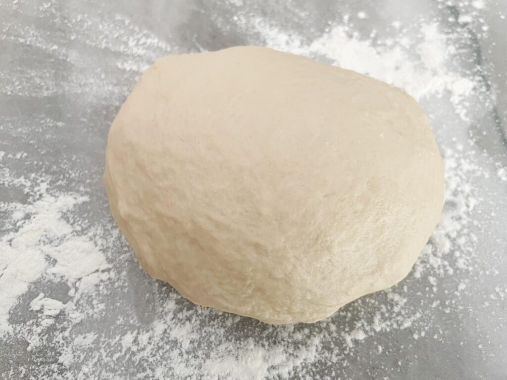 The pizza dough after being kneaded