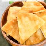 Pin of large Air Fryer Pita Chips in a brown wood bowl with title at top