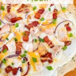 Pin of a Chicken Bacon Ranch Pizza on a pizza peel with title at top