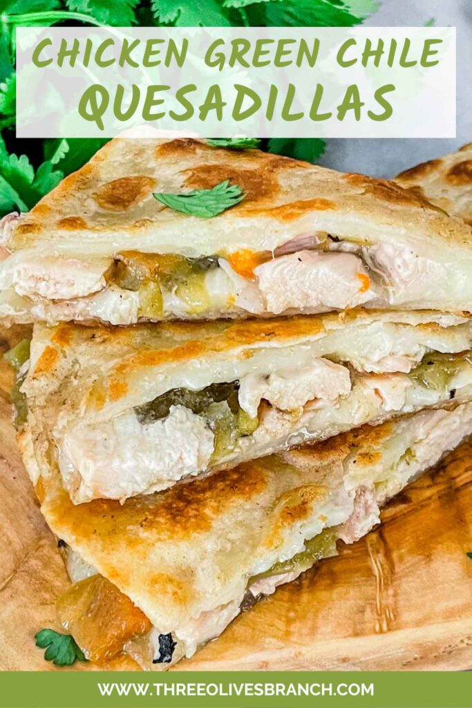 Pin of Hatch Green Chile Chicken Quesadillas pieces stacked on a tower on a wood board with title at top