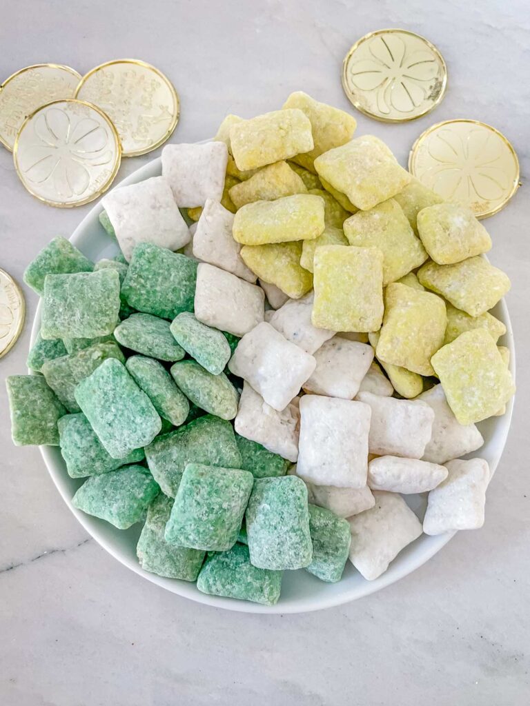 Green, white, and light green muddy buddies separated on a plate