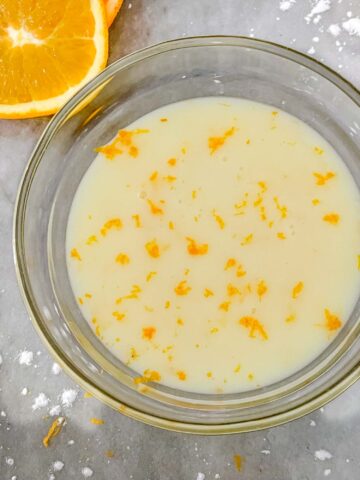 Top view of Orange Glaze in a clear bowl on a counter