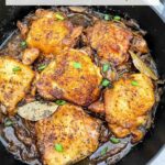 Pin of Beer Braised Chicken Thighs in the braiser with title at top