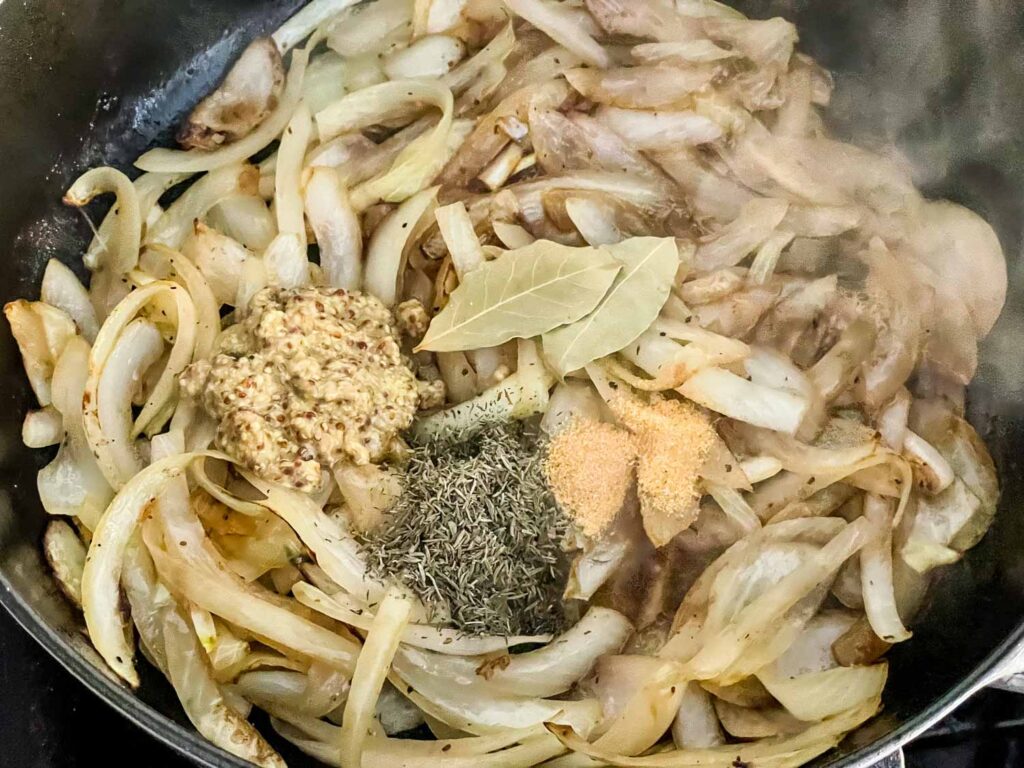 Cooking the onions and spices in the braiser