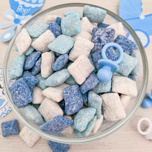 Top view of blue and white It's a Boy Puppy Chow in a bowl on a table