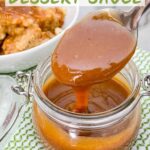 Pin for Irish Cream Dessert Sauce with a spoon dipping into a pot of the sauce and title at top