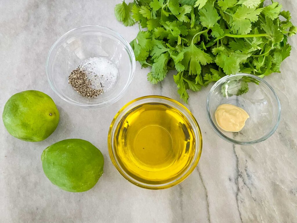 The ingredients needed for the dressing sitting on a counter