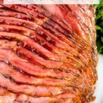 Pin of a Honey Mustard Glazed Spiral Ham Recipe fanned out and close up with title at top
