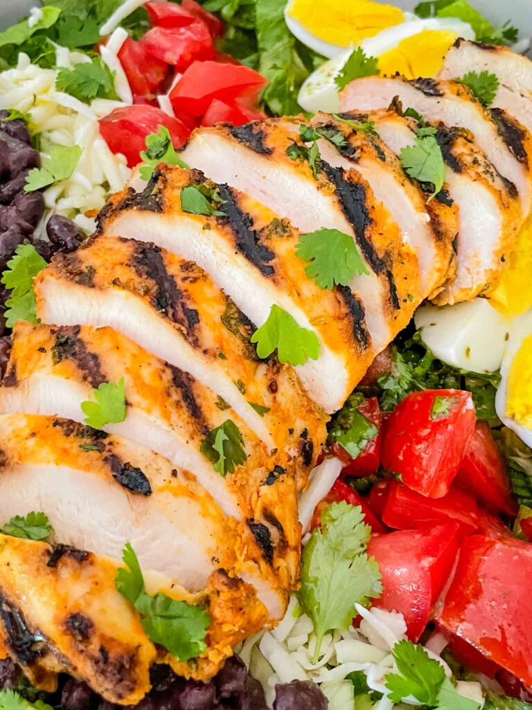 Cilantro Lime Grilled Chicken on a bed of Mexican Cobb Salad close up