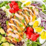 Pin of Mexican Cobb Salad wit sliced grilled chicken and title at top