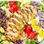 Pin of Mexican Cobb Salad wit sliced grilled chicken and title at top