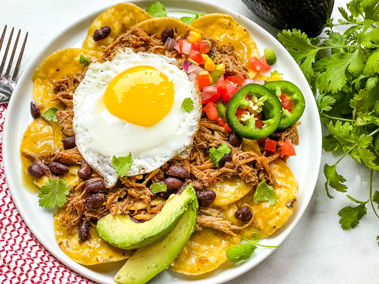 Pork Carnitas Green Chilaquiles with Eggs