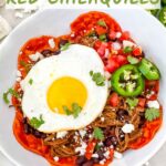 Pin of Shredded Beef Red Chilaquiles with an egg in a white bowl. Title at top
