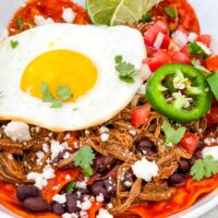 Shredded Beef Red Chilaquiles in a bowl