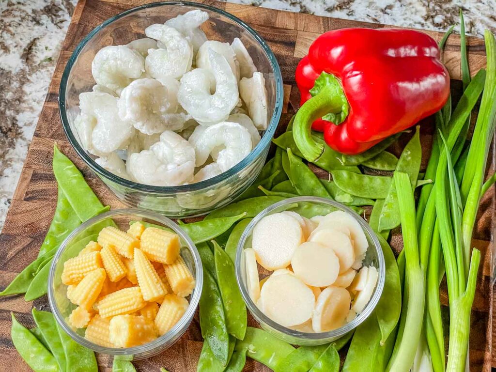 The ingredients needed sitting on a wood cutting board