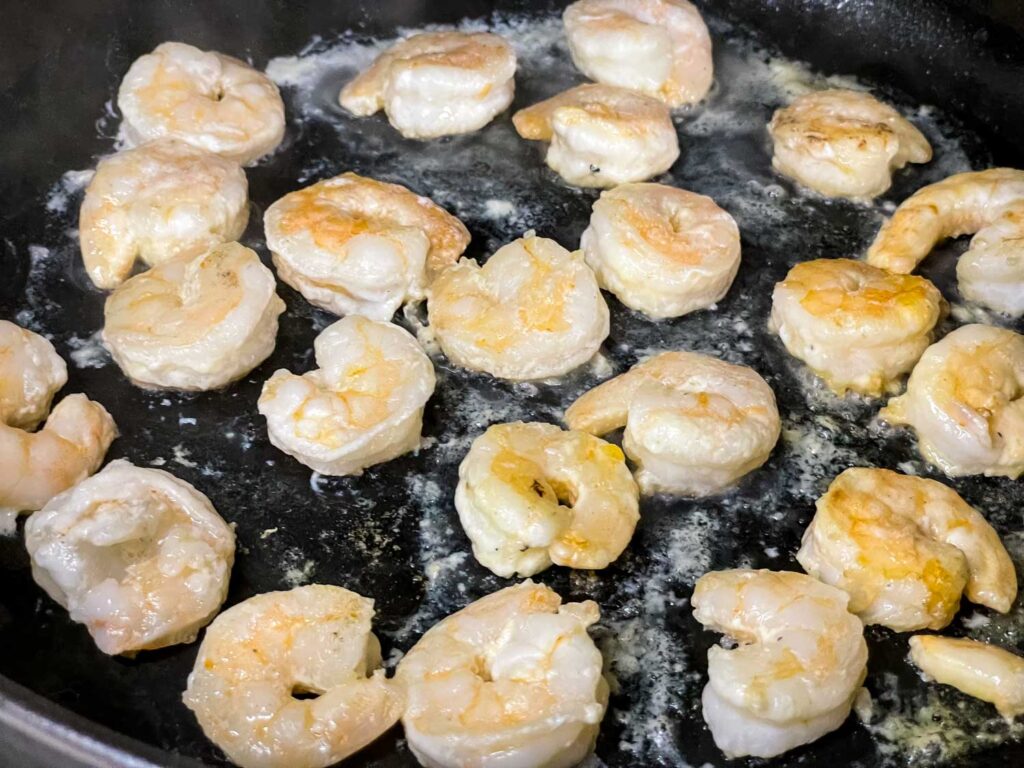 The shrimp cooking in the wok