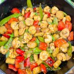 Sweet and Sour Shrimp Stir Fry in a large wok