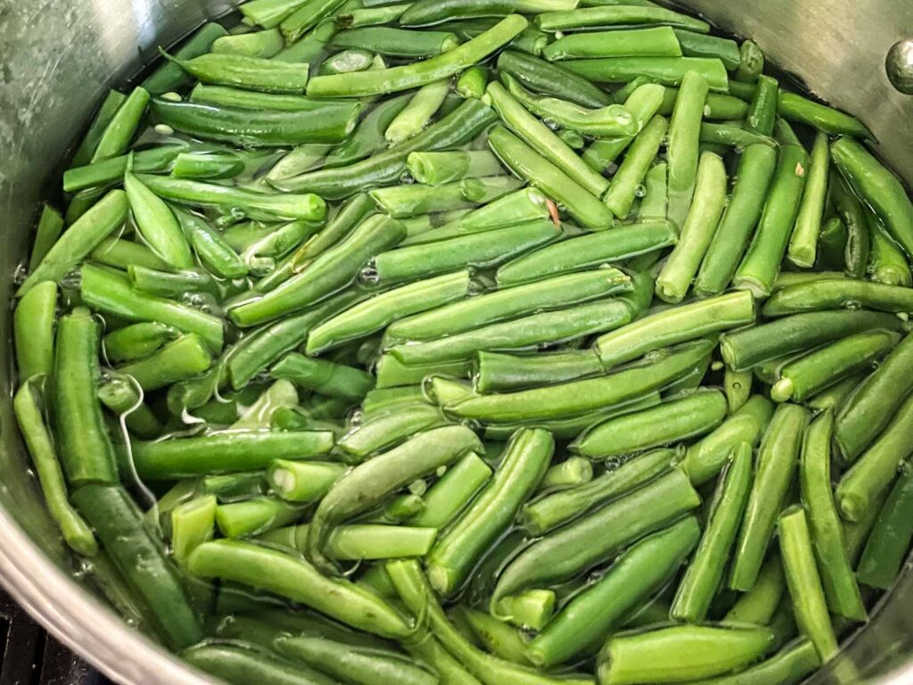 Green beans cooking in water