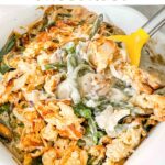 Pin of Green Bean Casserole with Fresh Green Beans being scooped out of a dish with title at top